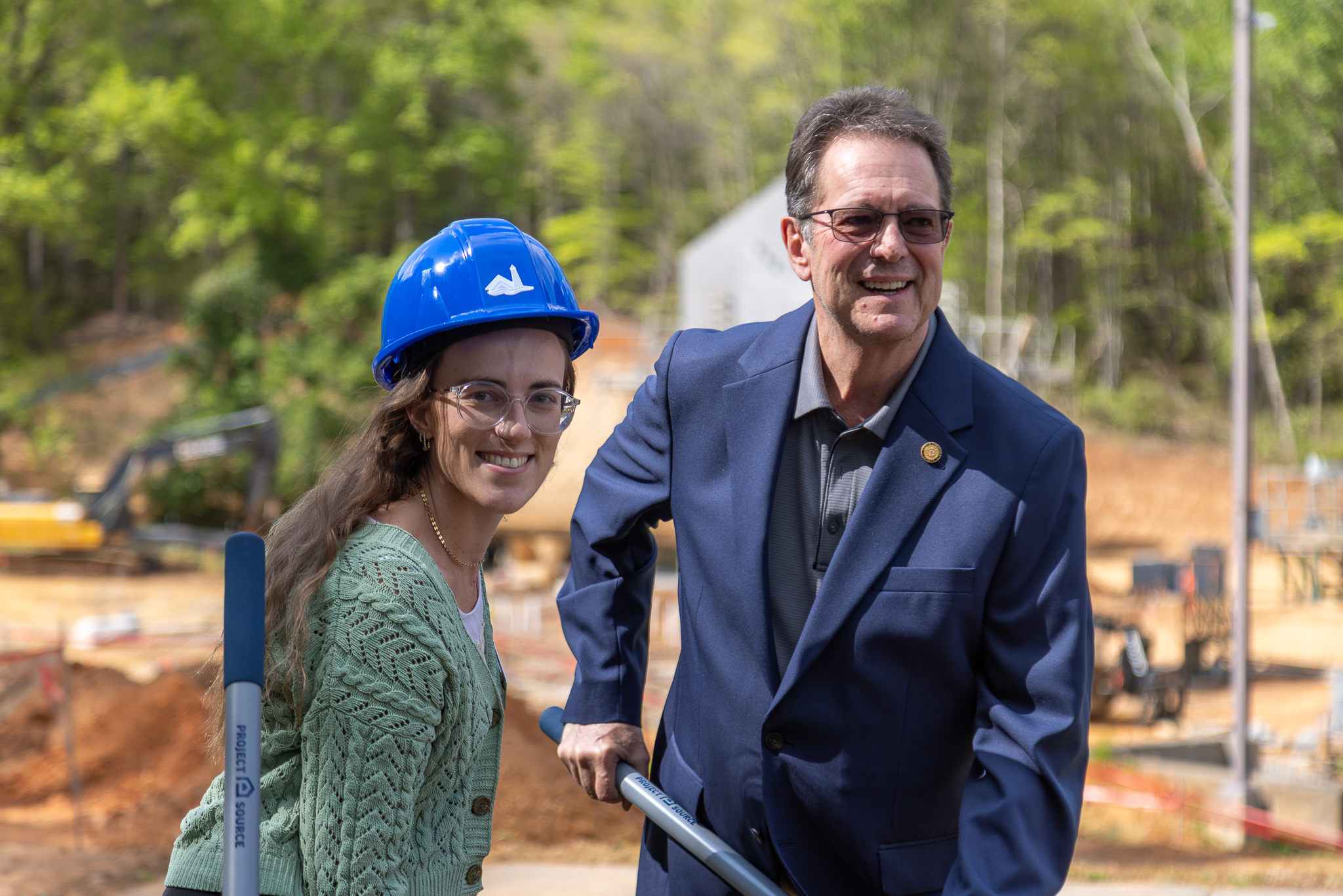 Emilee Higdon and Senator Corbin pose with shovels after the groundbreaking ceremony