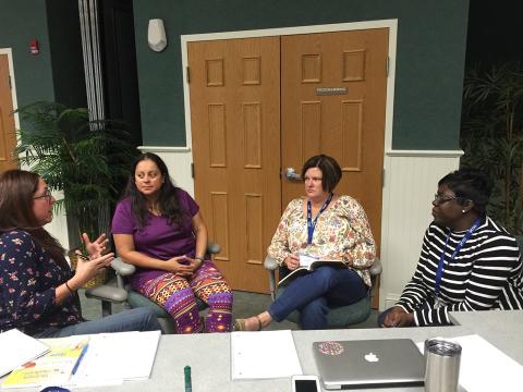 Teachers talking about NCCAT professional development at Ocracoke.